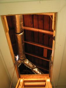 Brighton HVAC professional heads into attic to examine ducts